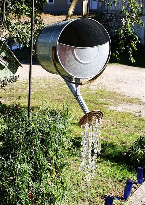Make Your Cottage Garden Sparkle With This Watering Can Feature 26