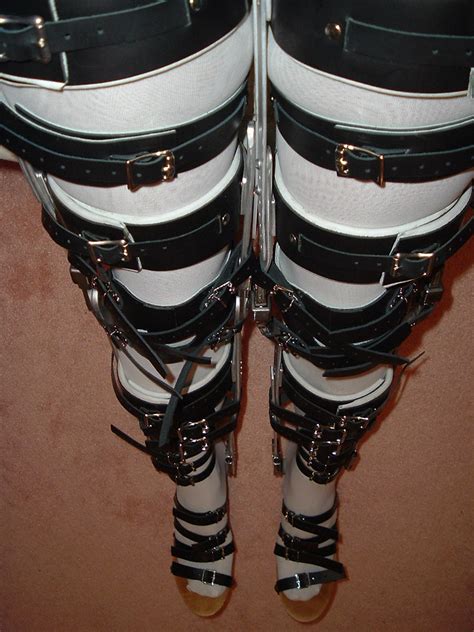 Legs Bound By Braces Severely Strapped And Locked Straight Flickr