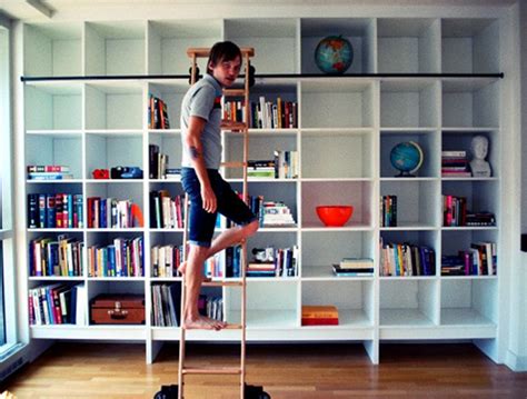 They are designed for sturdiness and functionality. Image result for bookcase with ladder and rail | Wall ...
