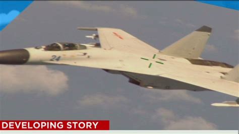 Chinese Fighter Comes Close To Us Navy Jet Cnn