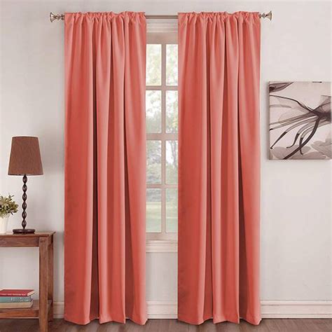 An energetic blue, as opposed to neutrals, paired with coral, gives the room a younger, but not childish, feel. 10 Coral Blackout Curtain Options and Ideas - The Sleep Judge