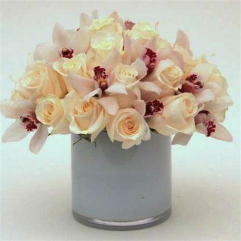 Cream Roses And Orchid Butterflies Sheer Elegance In Floral Design