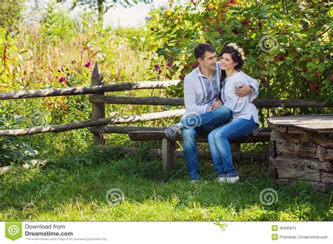 lovely couple sitting on bench and flirting stock image image of romantic clothes 46935913