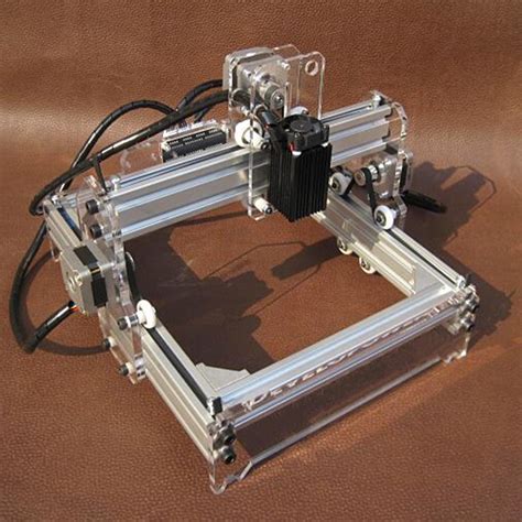 This diy laser cutter is 100% engineered with full detail drawings of every part. 31x26x23cm 12V 500mW Desktop DIY Laser Engraver Engraving ...