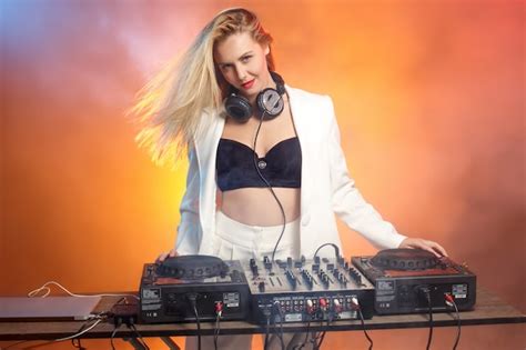 Free Photo Beautiful Blonde Dj Girl On Decks The Party