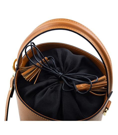 Bag definition, a container or receptacle of leather, plastic, cloth, paper, etc., capable of being closed at the mouth; Saffiano Leather bucket bag - Camelia Roma