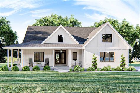 Modern Farmhouse Plan With Wraparound Porch And Vaulted Interior