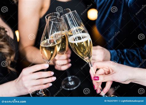 Women Holding Glasses With Champagne In Hands Stock Image Image Of Friendship Beverages 96247591