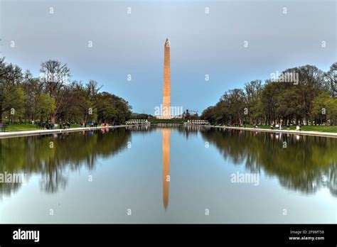 Washington Monument Reflecting In The Lincoln Memorial Reflecting Pool