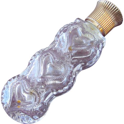 Lalique Designed Perfume Bottle Lay Down With Three Hearts From