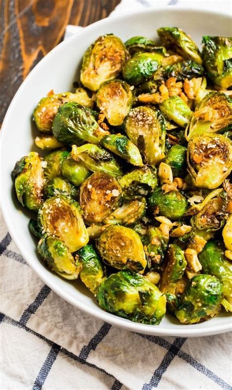 They are the perfect combination of sweet and salty, and make for perfect snack leftovers straight from the fridge the next day! Roasted Brussels Sprouts with Garlic {Easy and Tasty!} - WellPlated.com