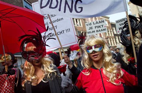amsterdam sex workers protest clean up of notorious red light district