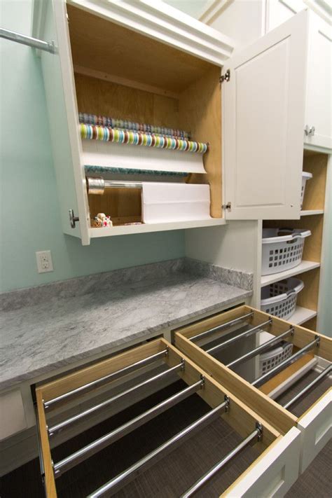 This drying rack is still working perfectly in the laundry room and definitely worth the effort since it's used almost every day! Built in drying rack laundry room transitional with white ...
