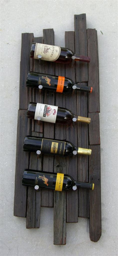 This wine rack from reclaimed wood is a perfect gift for men, birthday gift or a housewarming gift. Wine rack - Upcycled wine rack - Reclaimed wood wine rack ...