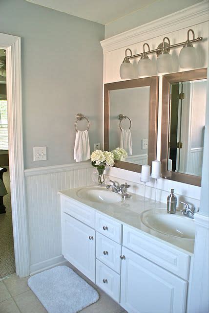 Bathroom makeover turned into major bathroom remodel. Amaing bathroom makeover! Love the idea to cover a large ...