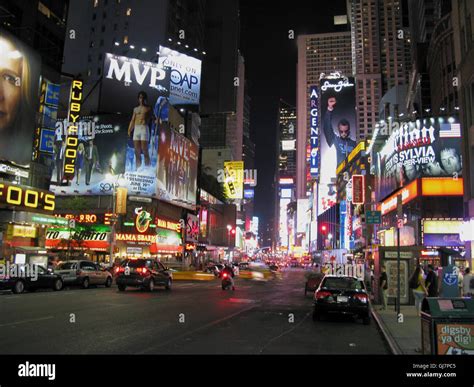 Broadway With Evening Traffic And Neon Signs Stock Photo Alamy
