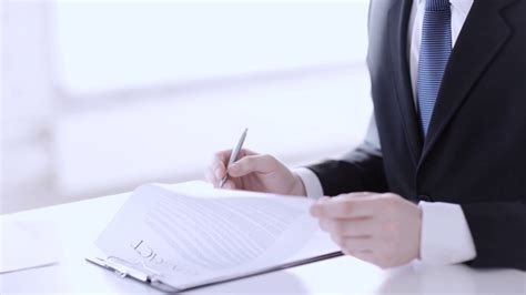 Man Signing Contract Female Assistaint Stock Footage Sbv 306062643