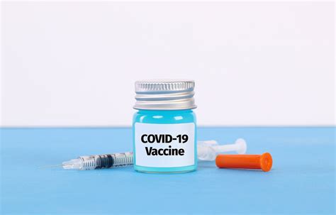 The announcement came as government officials also said the country had purchased vaccines from two major developers. Syringe with Covid-19 vaccine | Jernej Furman | Flickr