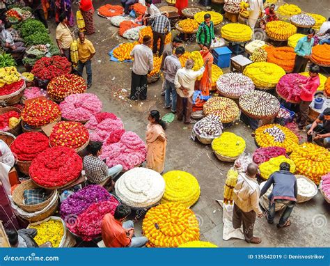 Flower Sellers And Their Customers At Colorful Kr Market In Bangalore