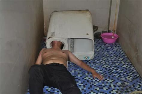 Hapless Man Gets Head Stuck In Washing Machine While Trying To Fix Appliance In Epic Diy Fail