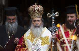 Greek Orthodox Patriarch Of Jerusalem Theophilos Stands At The