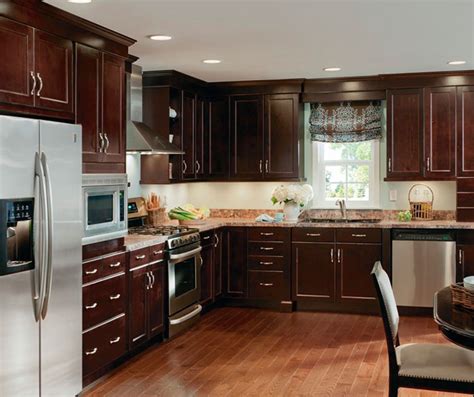 I'm also told that it is difficult to refinish manufactured wood cabinetry in the future. Alder Cabinets in Casual Kitchen - Kitchen Craft Cabinetry