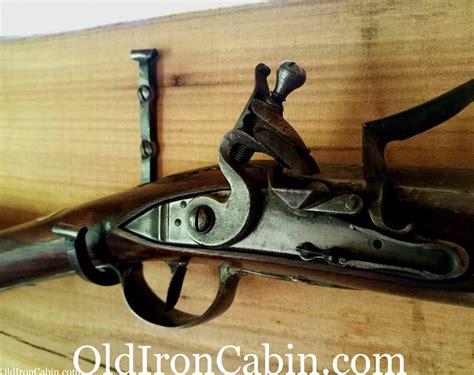 wall mount gun hooks old iron cabin