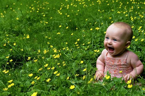 Joyful Baby In Flowers Photograph By Lorraine Devon Wilke