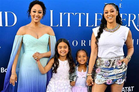 tia and tamera mowry enjoy date night with their daughters at the little mermaid premiere photo