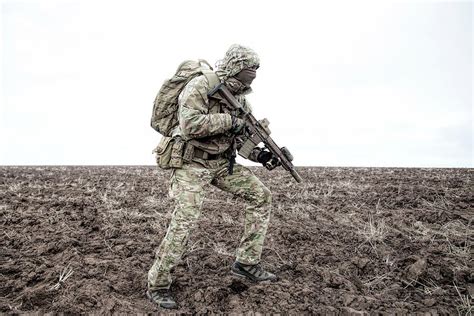 Military Mercenary Wearing Hooded Camo Photograph By Oleg Zabielin