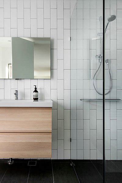 One example of a good layout for large format tile in a small bathroom would be four tiles down the length of the bathroom and three across the width. Bathroom Inspiration: Gorgeous Tile Ideas