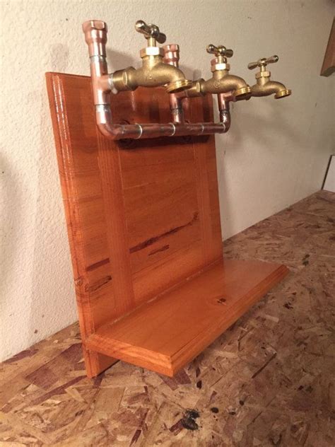 Height of your bottle, as per instructions on the back of the package small protective felt squares below the oak base may need to be replaced… Triple Wall Mount Liquor Dispenser With Shelf by ManMadeForManCave | Liquor dispenser, Alcohol ...