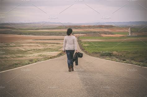 Woman Walking Alone In A Road High Quality People Images ~ Creative