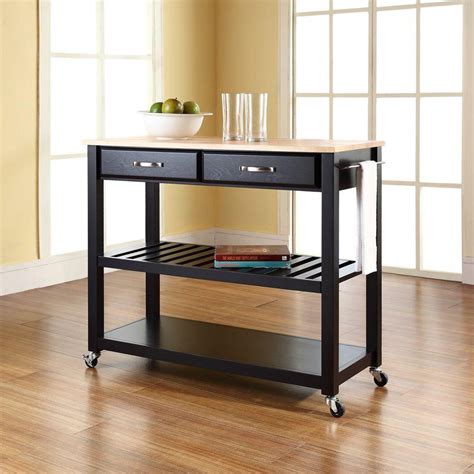 If you have enough room, add a small kitchen island with cabinets or drawers for kitchen towels or a small cart. Kitchen Carts - Carts, Islands & Utility Tables - The Home ...