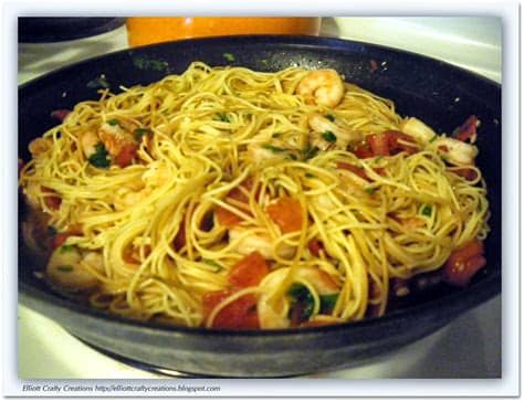 Large shrimp sautéed with tomatoes, lemon, garlic, herbs and fresh basil on top of angel hair pasta with a touch of marinara sauce. Elliott Crafty Creations: Tasty Tuesday: Angel Hair Pasta ...
