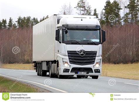 Assembly branches were opened in spain, brazil, argentina and australia, the licensed the daimler benz joined the u.s. White Mercedes-Benz Actros Semi Truck On Spring Road Editorial Stock Photo - Image of ...