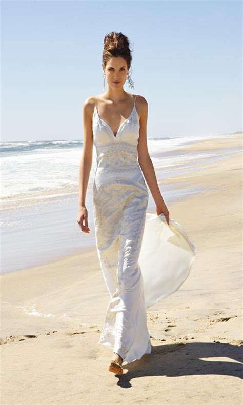 Linen pants, floral shirts, and sandals are all good options. 20 Unique Beach Wedding Dresses For A Romantic Beach ...