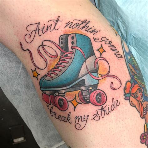 A Tattoo With Roller Skates And Words On The Arm That Says Im Not