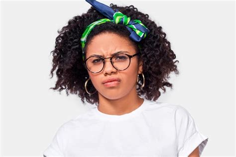 Premium Photo Unsure African American Young Woman Student Has Dilemma