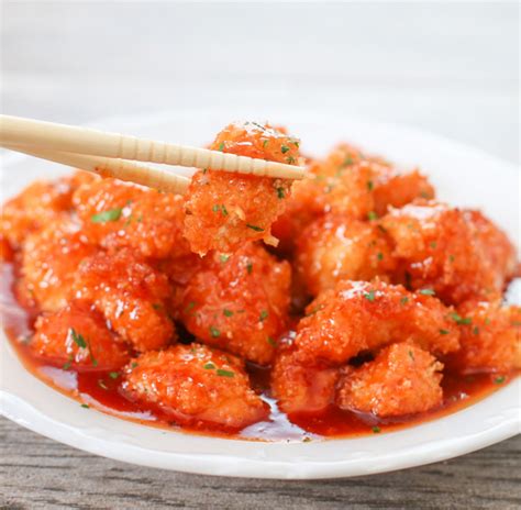Serve immediately on a bed of rice with chives as garnish. Baked Sweet and Sour Chicken - Kirbie's Cravings