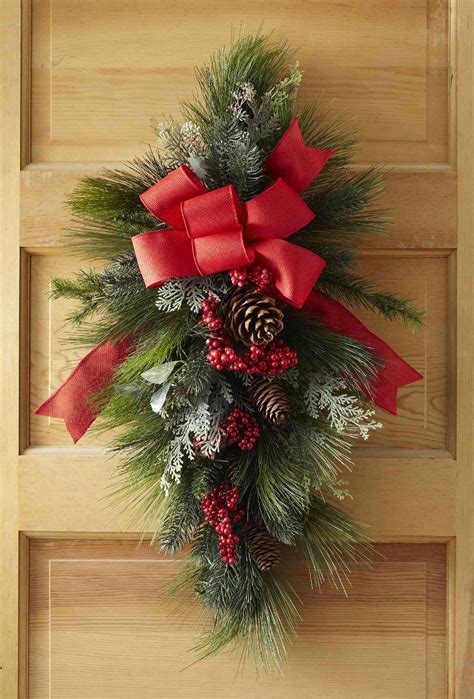 Looking for do it yourself ideas. Make Your Own Christmas Swag Wreath in Just 30 Minutes | Christmas wreaths, Diy christmas door ...