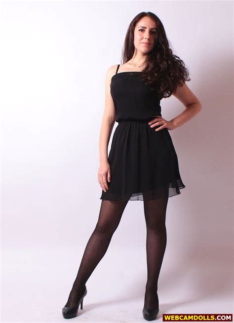 brunette girl in sheer pantyhose and black minidress on webcamdolls
