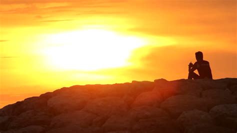 Man Silhouette Sunset Stock Footage Video 2580587 Shutterstock