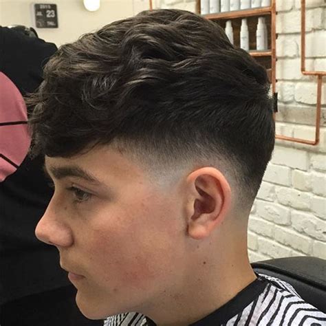 Low fade long hair on top. Taper Vs Fade Haircut, Choose The Best Hairstyle For You ...