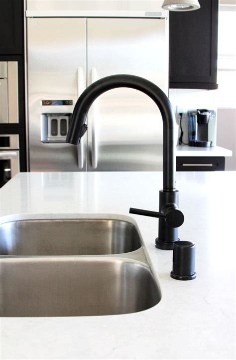 Black faucets also are great at disguising small marks like fingerprints and water spots. Black is the New Black | Black kitchen faucets, Kitchen ...