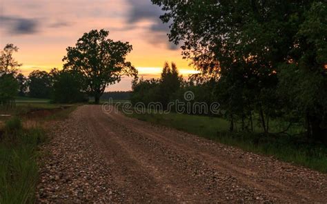Field And Country Road Natural Sunset Colours Stock Image Image Of