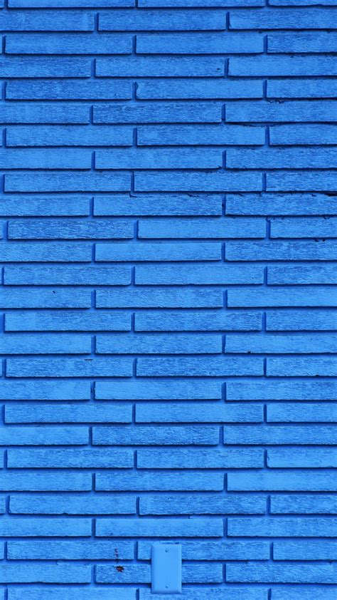 Download Wallpaper 1350x2400 Wall Brick Rough Surface Texture Blue