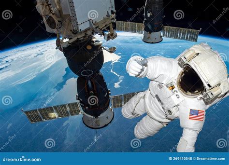 Astronaut Float In The Space In Weightlessness Working On The Spaceship