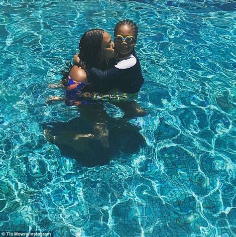 tia mowry flaunts her slimmer form in patterned bikini daily mail online