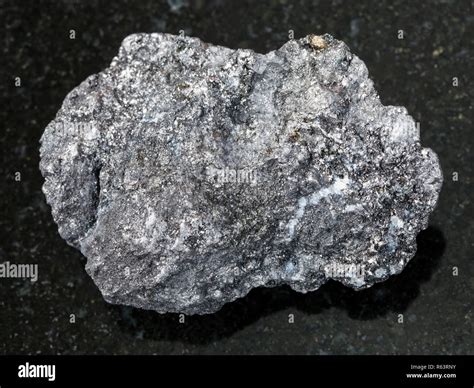Rough Graphite Stone On Dark Background Stock Photo Alamy